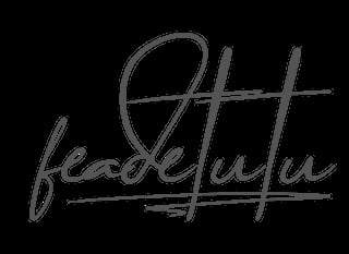 Handwritten signature or autograph reading head lulu with crossed-out lines on black background